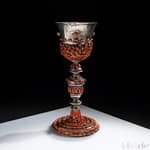 Antiques 16 Silver and coral chalice, Catania first half of the 17th century Decorated with plant motifs and small cherub heads.