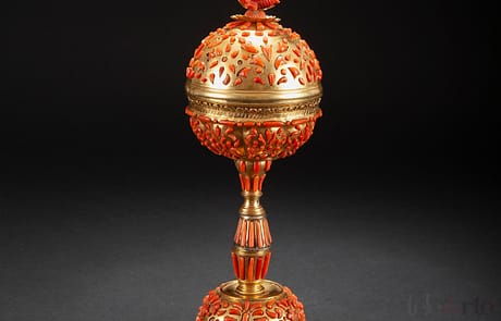 Gilded copper and coral ciborium, Trapani first half of the 17th century Placed on a circular base, the lid bears a socket in the form of a dragon Gilded copper and coral ciborium, Trapani first half of the 17th century Placed on a circular base, the lid bears a socket in the form of a dragon